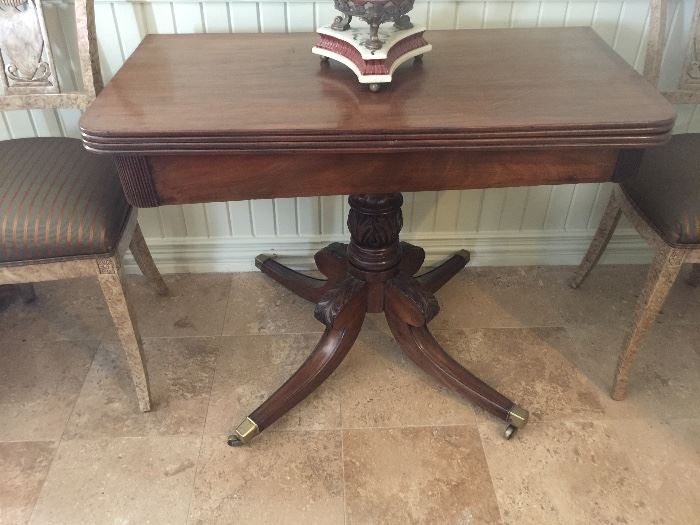 Antique game table, top opens up