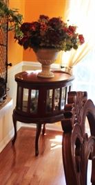 Glass display side table, floral arrangement