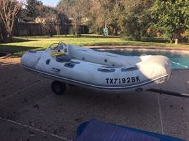 Achilles mechanically inflatable boat with trailor