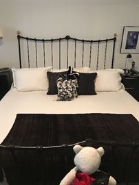 black iron bed frame. bed is a water bed
