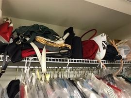 tons of clothes and purses. clothes size small mint condition
