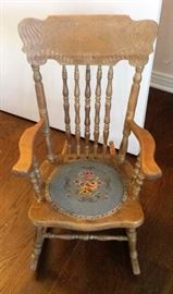 child's rocker with needlepoint seat
