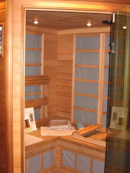 Sunlight cedar wood 5 person Far Infrared Corner Sauna, inside & out controls, lighting and Blaupunkt sound system  $2500 (Bids accepted above half price)
