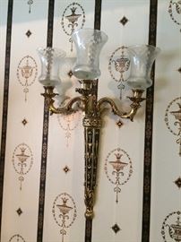 One of two matching wall sconces