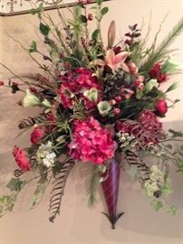 One of two matching floral wall arrangements