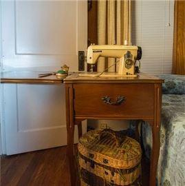 Nelco Sewing Machine and Cabinet:  90.00  