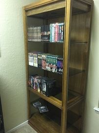 Display case and VHS and DVDs