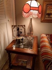 Those lamps! I knoooooow! A pedestrian pair of 1970's wooden end tables, with beveled glass and oh-so-glamoooor faux bamboo.