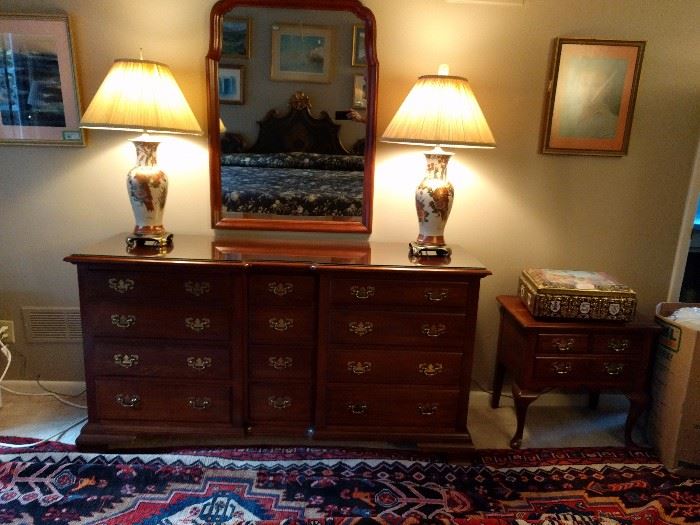 Bad lighting, but this is the dresser, with matching mirror, by Pennsylvania House. the end table on the right matches the set.                                                                            A nice pair of Asian-ish porcelain table lamps, with nice shades and finials.
