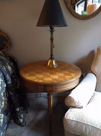 Nicely inlaid pecan wood side table, with one of a pair of Italian table lamps.