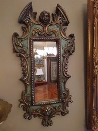 One of a pair of very unique wall mirrors in the second dining room.