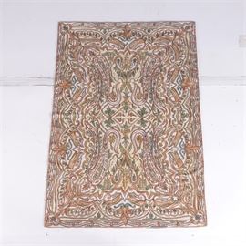 Hand-Embroidered Crewelwork Wool Area Rug: A hand-embroidered crewel wool area rug. The design has been hand-stitched using wool yarn in shades of corn silk, white, mustard, marigold, buff, espresso, olive, sage, and leaf green. The symmetrical design incorporates boteh motifs, arabesques, lanceolate, leaves, modified palmettes, and flowers. The rug is backed with off-white woven fabric and is not marked.