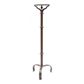 Jan Barboglio Iron Pedestal: A Jan Barboglio steel pedestal. The over 5’ tall pedestal features a round platform with a slightly curved edge. The dish is supported by an open floral design atop a post ending with a tripod base. The piece has a copper-tone brushed finish with the maker’s mark present to a bolt at the base.