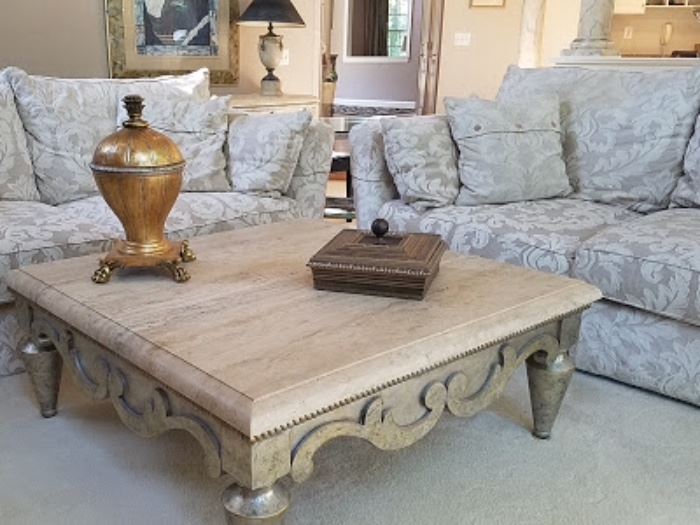 Another view of Sofas, stone coffee table by Swaim furniture and decor.
