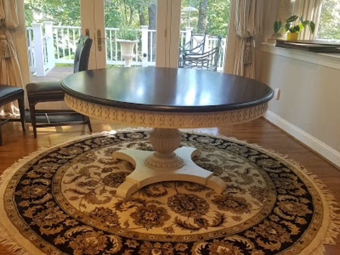 Henredon 60" round table, has protective pad, rug is for sale.
