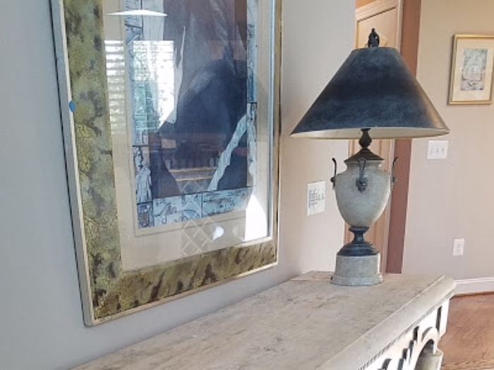 Console table, lamp and artwork