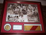 Norm Sloan - 1974 National Champions and 1983 National Champions
Including William Neal Reynolds Coliseum North Carolina State University- Authentic Home Floor (1949-1999)
Picture includes: Coach Les Robinson, Coach Norm Sloan (1974 NCAA Champs), 1973-74 NCAA Championship team,Coach Jim Valvano (1983 NCAA Champs), Coach Everett Case, David Thompson (1974 NCAA Champs), Coach Kay Yow, Coach Press Maraivch, Coach Herb Sendek and 1982-83 NCAA Championship team