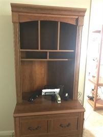 Matching shelf and file cabinet.