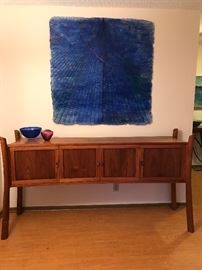 Amazing award winning hand crafted console table. It is truly a stunning piece of furniture! Pictured above is an original work of art by Jantje Visscher entitled; "Pyramid and Orbits"( Acrylic 48x48)