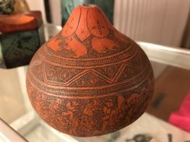 Hand-crafted work of art on a gourd 