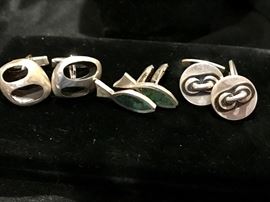 Sterling cuff links. Pair on the right are made in Denmark.