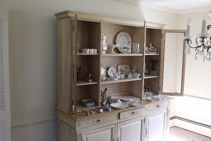 china cabinet filled with interesting items