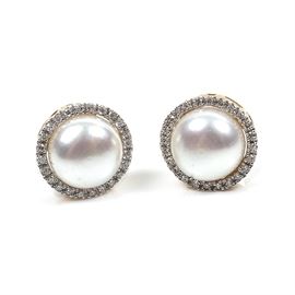 Pair of Alwand Vahan 10K Yellow Gold, Pearl and Diamond Earrings: A pair of 14K yellow gold stud earrings with diamond surrounded pearls.