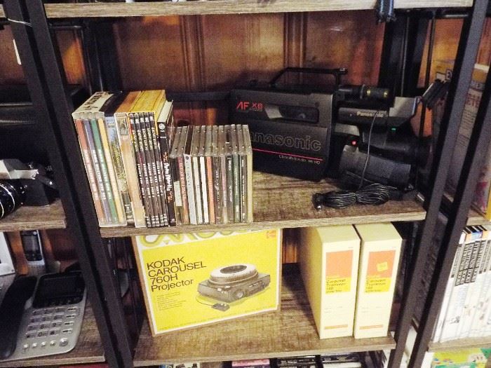 Panasonic 8mm movie camera and Kodak Carousel projector and trays