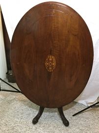 Oval tilt-top breakfast table