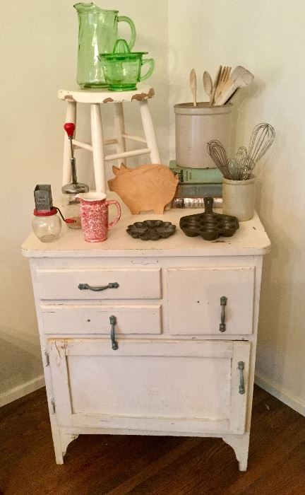 All sorts of fun vintage and antique pieces through the home. This vintage bakers table is priced to sell fast! 
