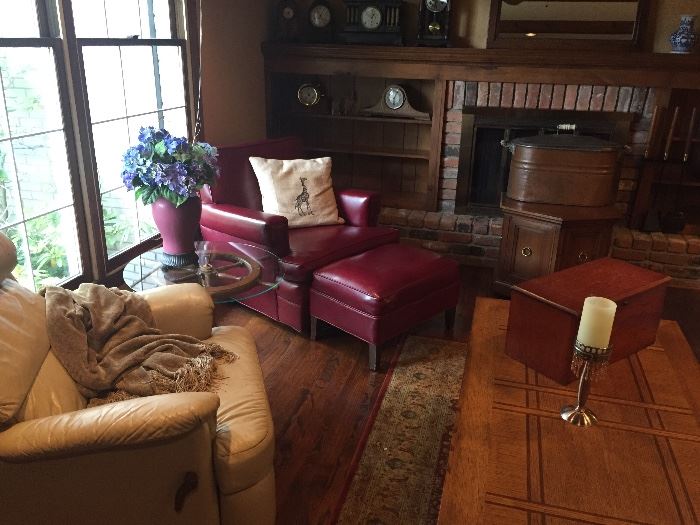 Leather reclining arm chair, red leather arm chair and ottoman, area rug and great art items!