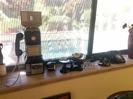 Coin operated real payphone and vintage phones 