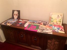 Vintage stereo cabinet with record player inside selling for $50.00 - LP's record albums @ $1.00 each record - 
