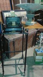 old scales, antique adding machine on a tall cart 