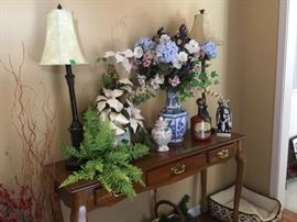 Entry table with lamps and decor
