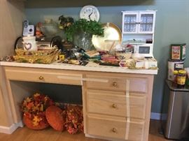 Another desk with lots of decor and other items