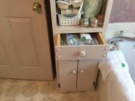 Bottom portion of bathroom cabinet