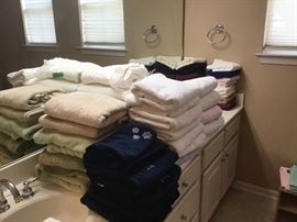 Towels, washcloths, and hand towels - a few bath rugs