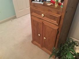 Bottom of shelving unit in bedroom