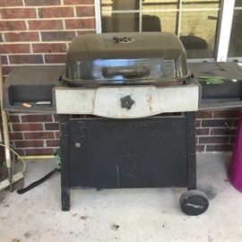 Grill with Items on screen porch