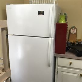 Top freezer refrigerator in excellent condition for sale