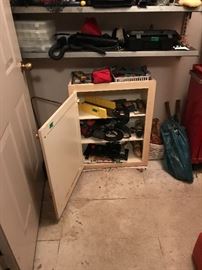 Room off garage - cabinet full