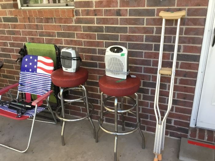 Screen porch - Vintage stools, crutches, lawn chairs