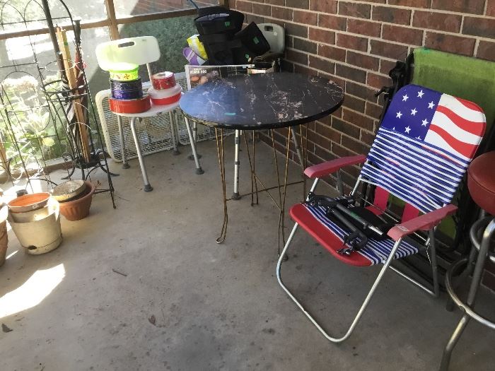 Screen porch - Ice cream table (no chairs), bath chairs, tins
