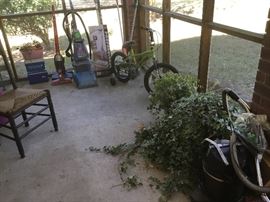 Rainbow vacuum, child’s bicycle, Shark vacuum, other cleaners