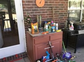 Screen porch - Moveable cabinet and garden items