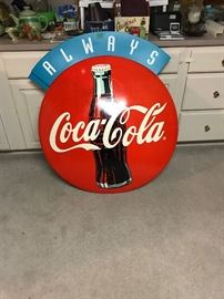 Two of these plastic Coca Cola signs