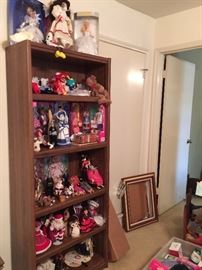 bookcase and dolls