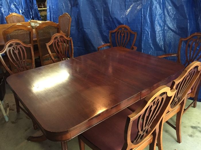 Vintage table with 6 chairs and pads. 
