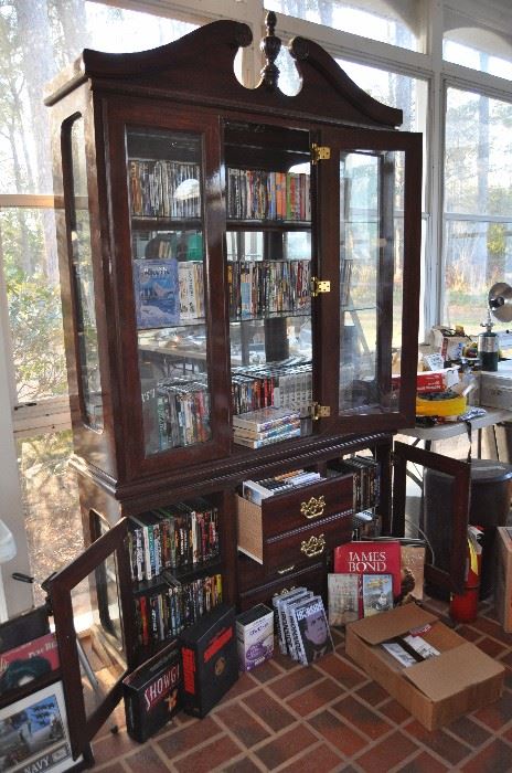 Queen Anne China Cabinet - full of DVD's and VHS's